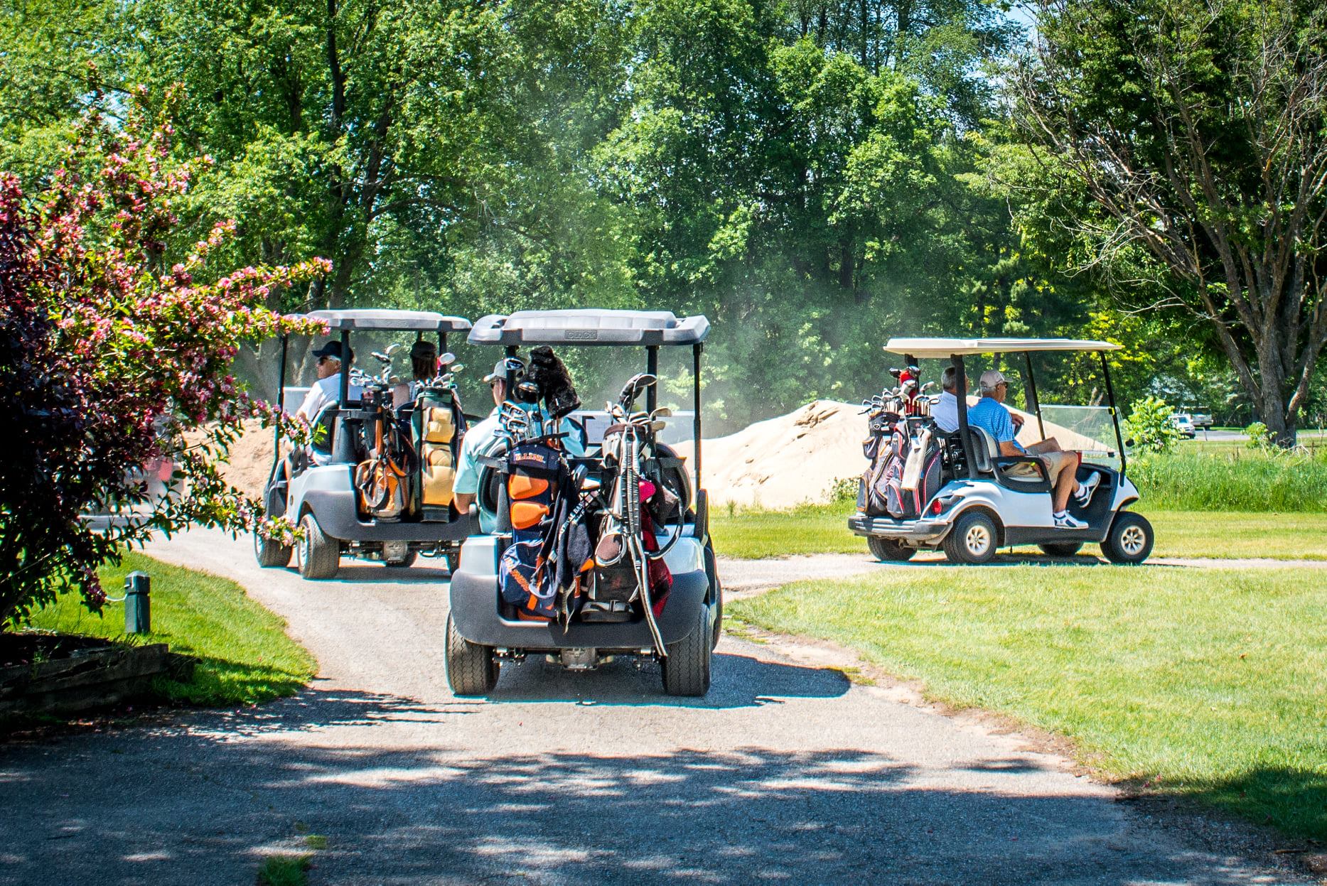 Golf carts heading out